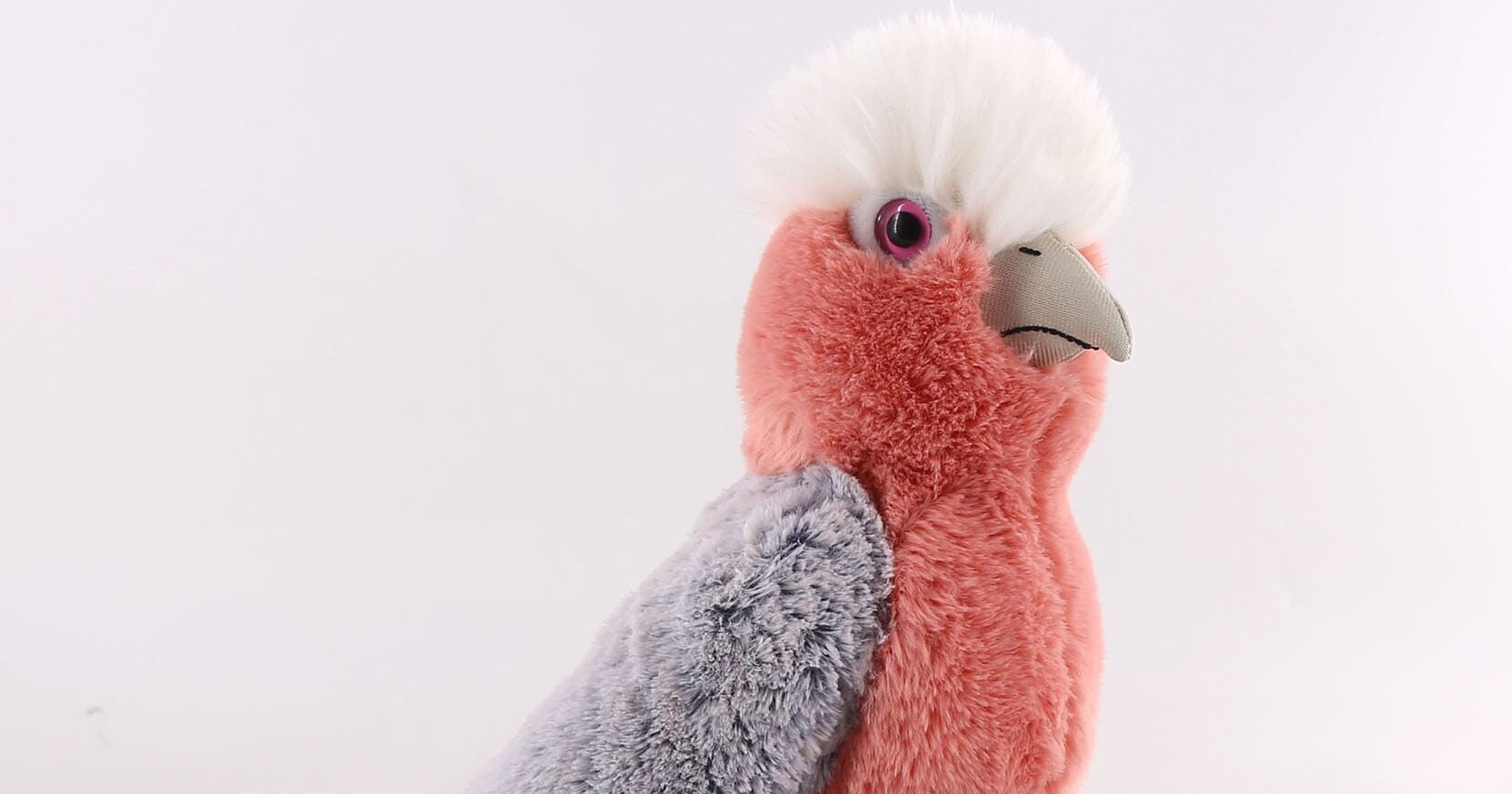 鮮やかなモモイロインコくんぬいぐるみ | 羽のある動物シリーズ | 製品