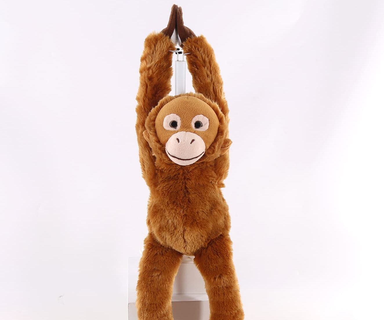 34973 Hanging baby orangutan